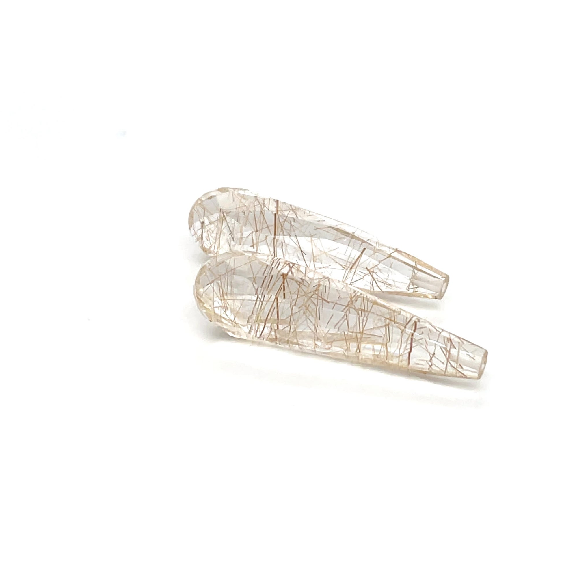 Rutilquarz 26.9x7.7x7.7 mm 21.56 ct