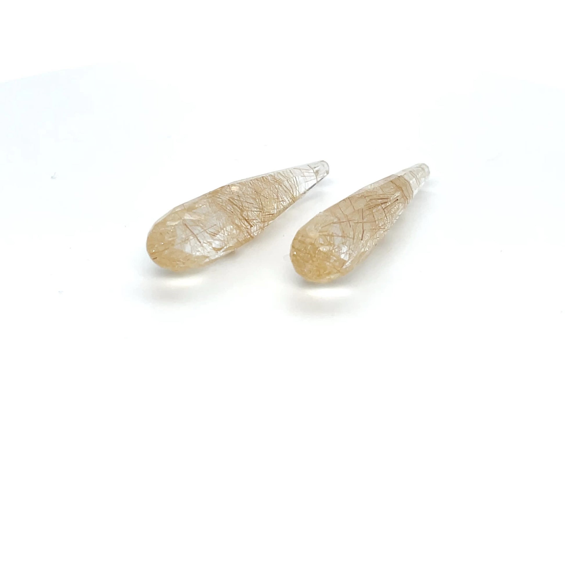 Rutilquarz 32.9x7.8x7.8 mm 25.69 ct